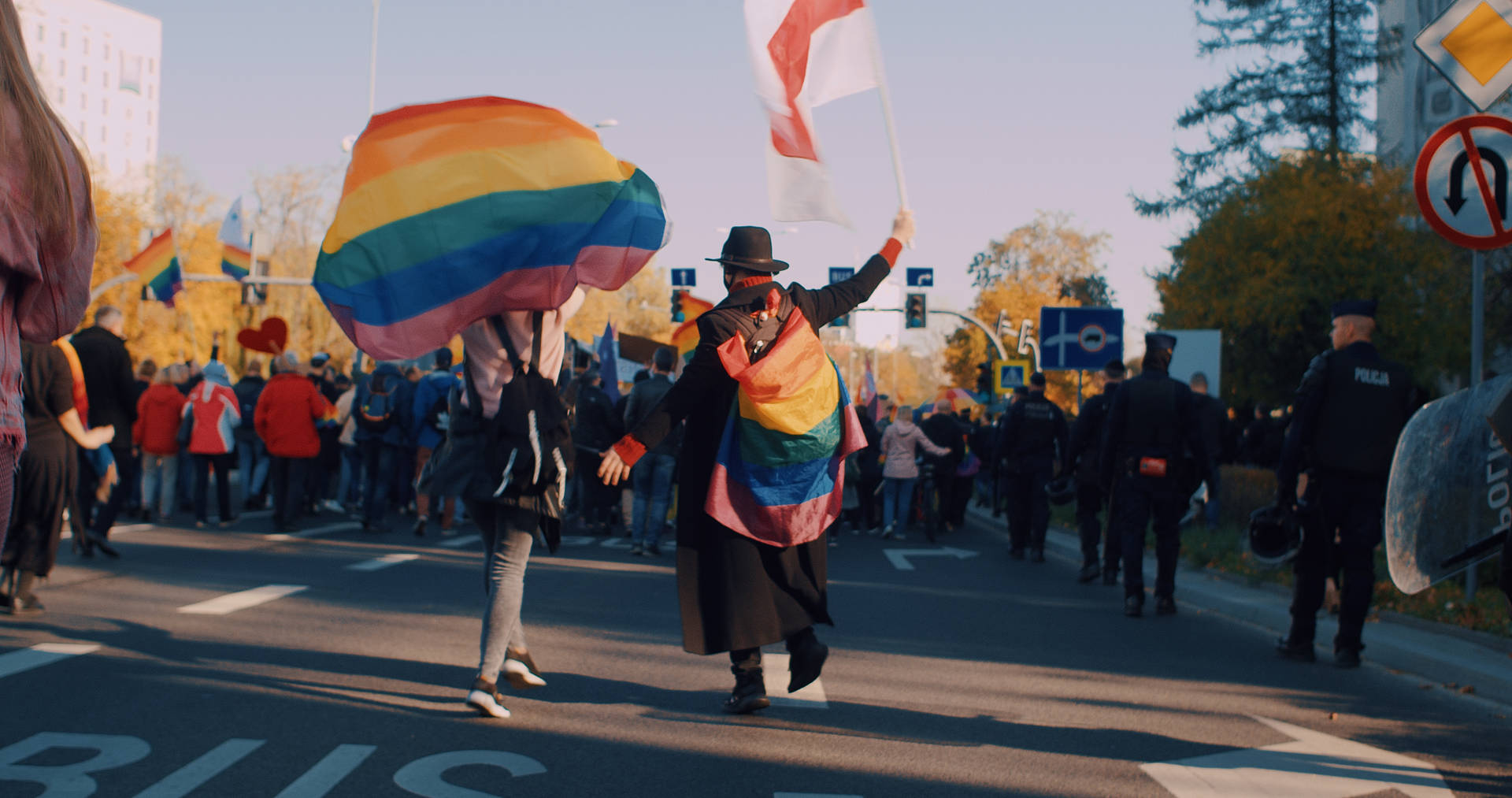 Non-binary Raising Flags Rallying Background
