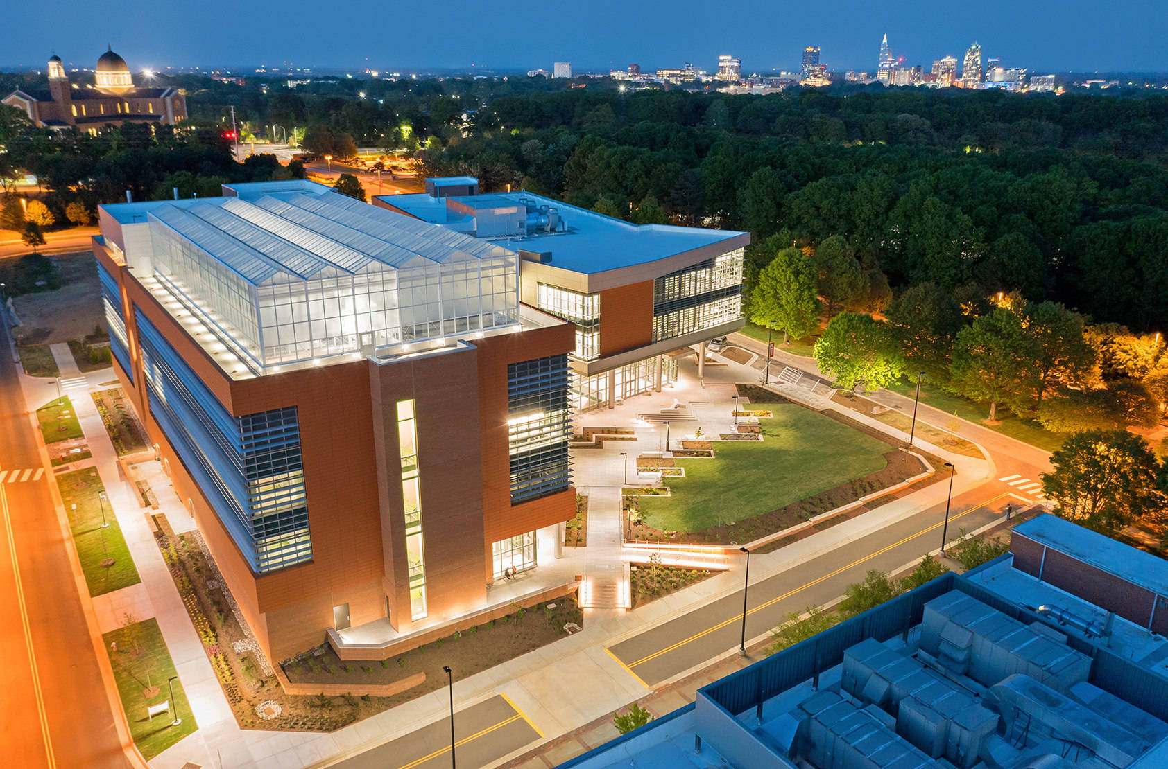 North Carolina State University Plant Sciences Building At Night Background