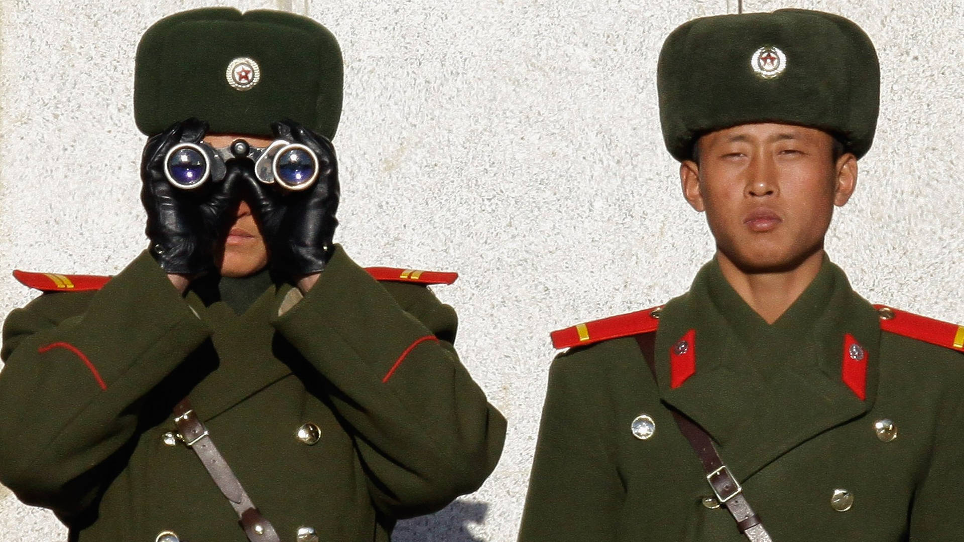 North Korea Soldier With Binoculars Background