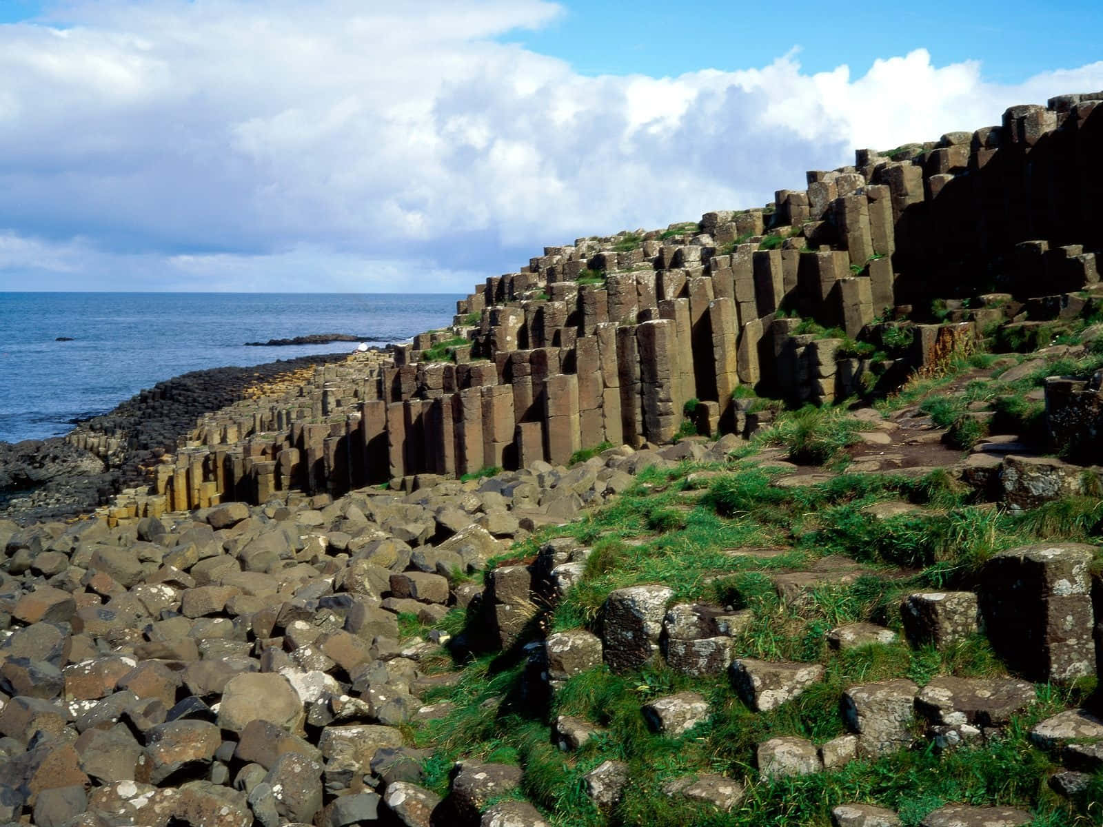 Northern Ireland Giant's Causeway Thick Clouds Background