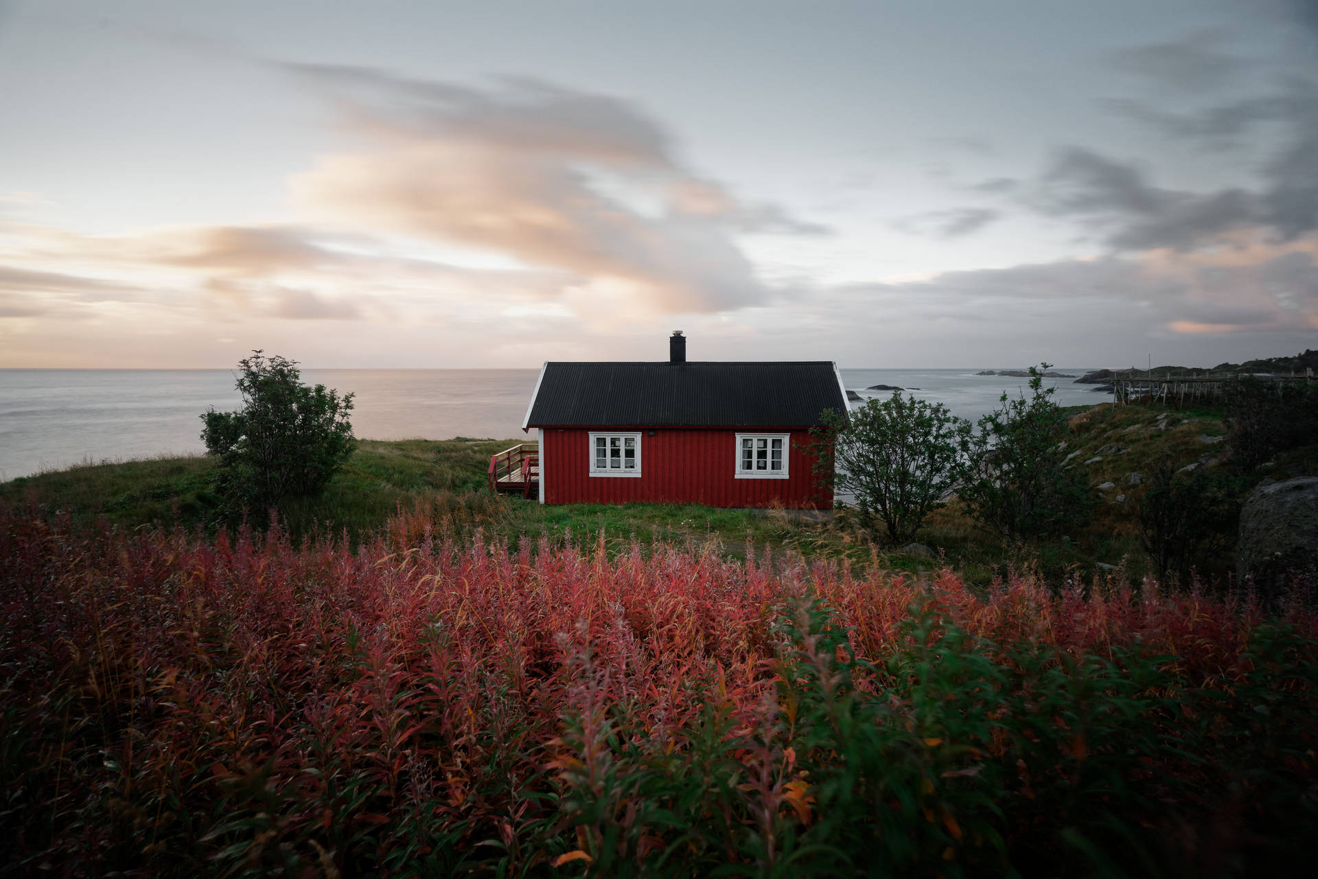 Norway House In Hamnøya Village Background