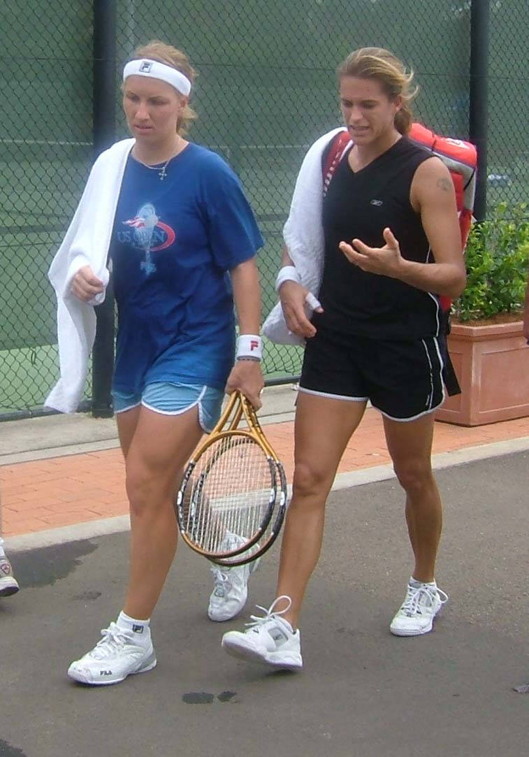 Notable Professional Tennis Players, Svetlana Kuznetsova And Amelie Mauresmo In A Match. Background