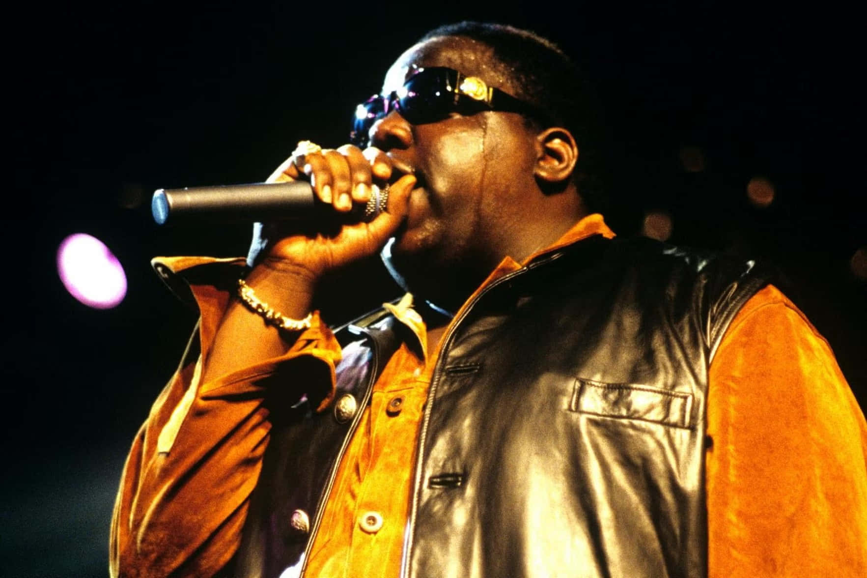 Notorious B I G Performingon Stage Background