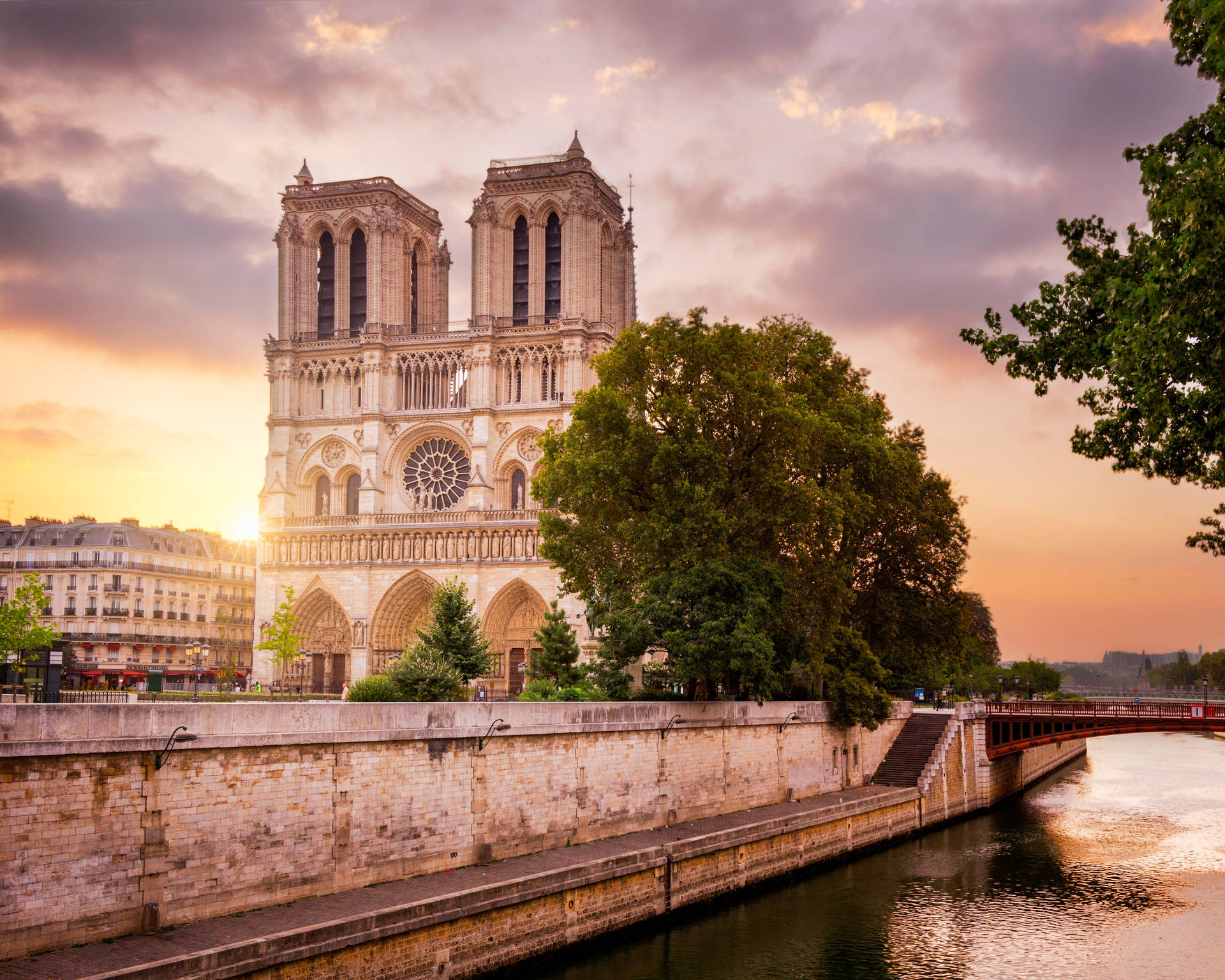 Notre Dame And Seine At Dusk Background