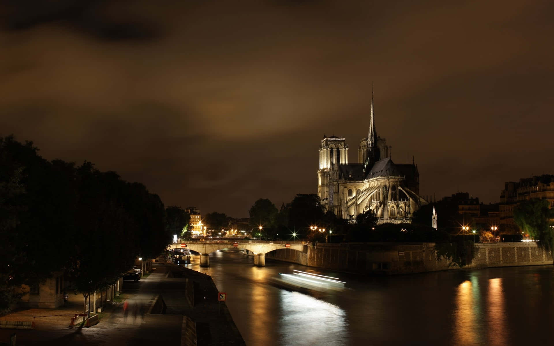 Notre Dame Cathedral With Wide View Of Scenery Background