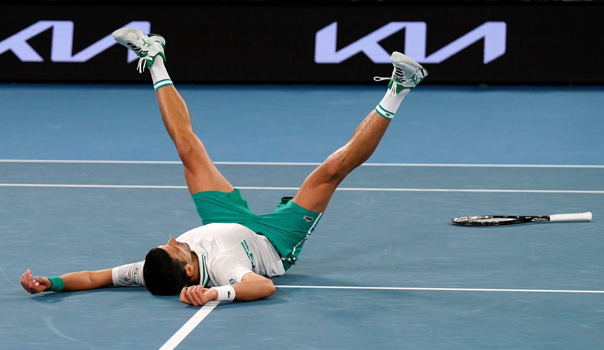 Novak Laying On Australian Open Court