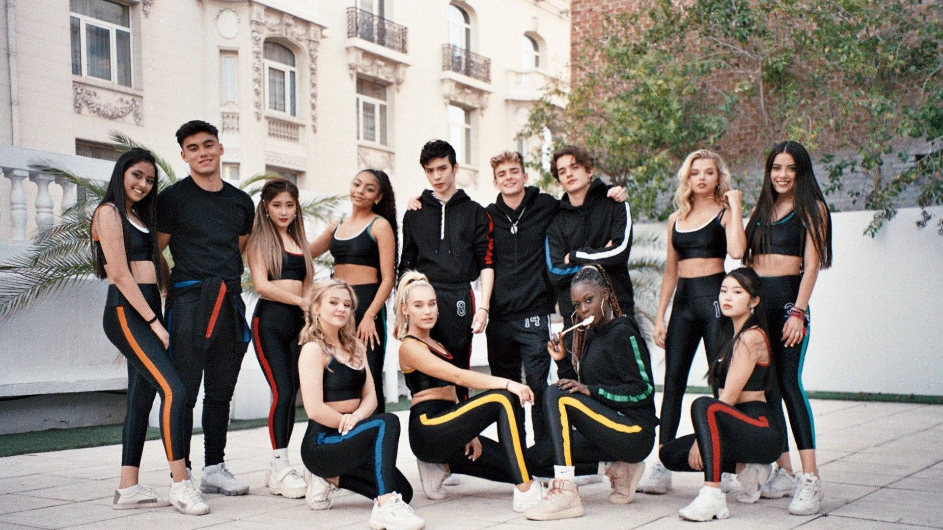 Now United Posing Outdoors Background