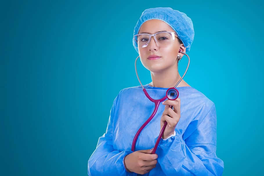 Nursing Wearing Her Ppe And Stethoscope Background