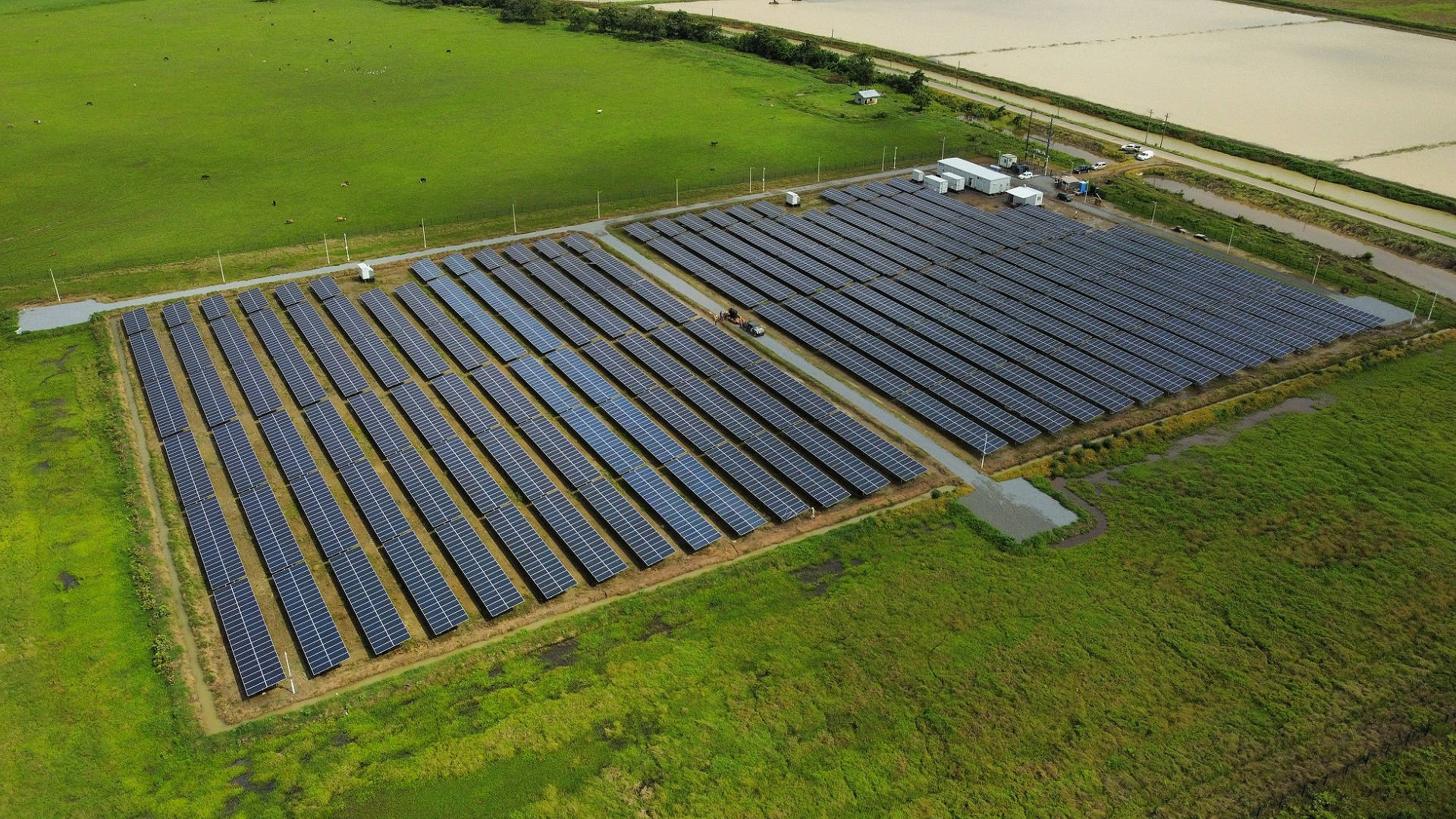 Nv Energy Grid On Grass Field Background