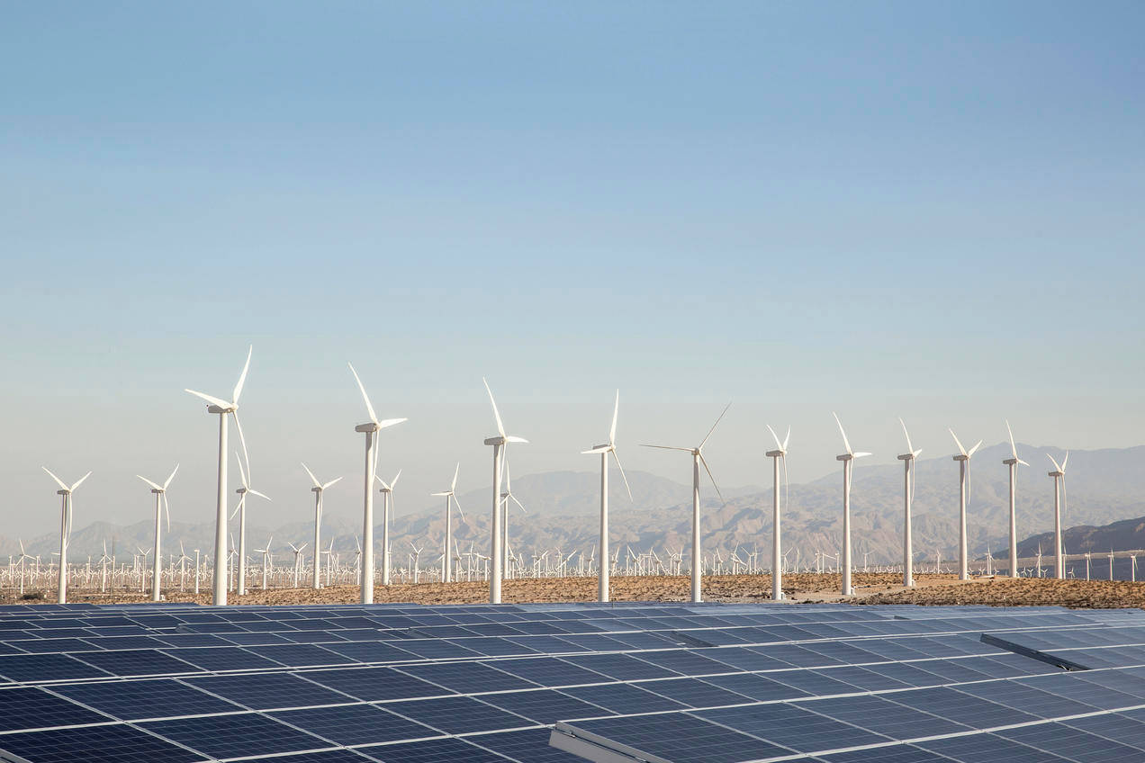 Nv Energy Power Plant With Windmills Background