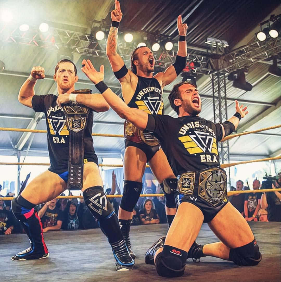 Nxt Champions With Roderick Strong Background