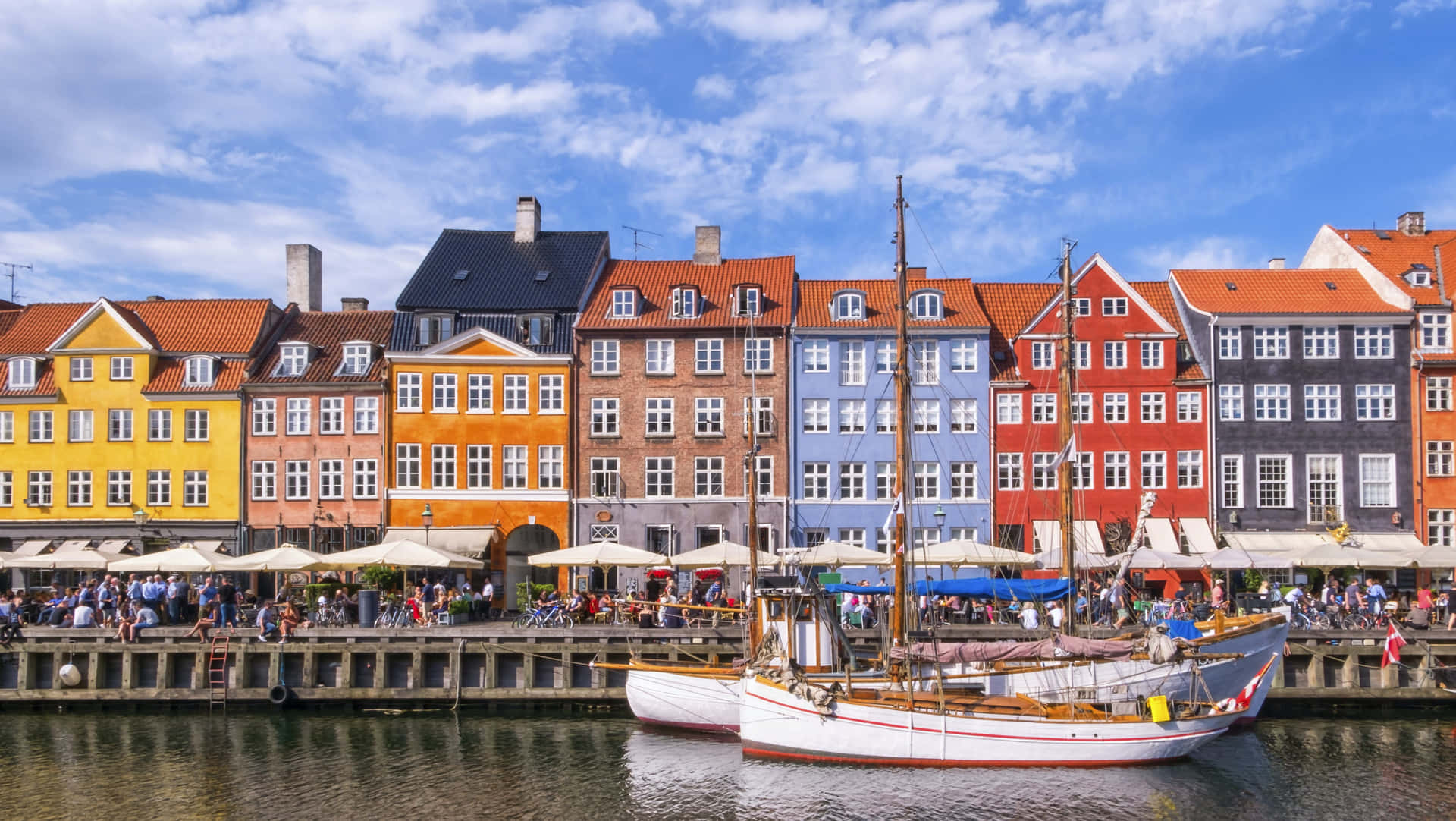 Nyhavn Port Tourists In Harbor Restaurants Background