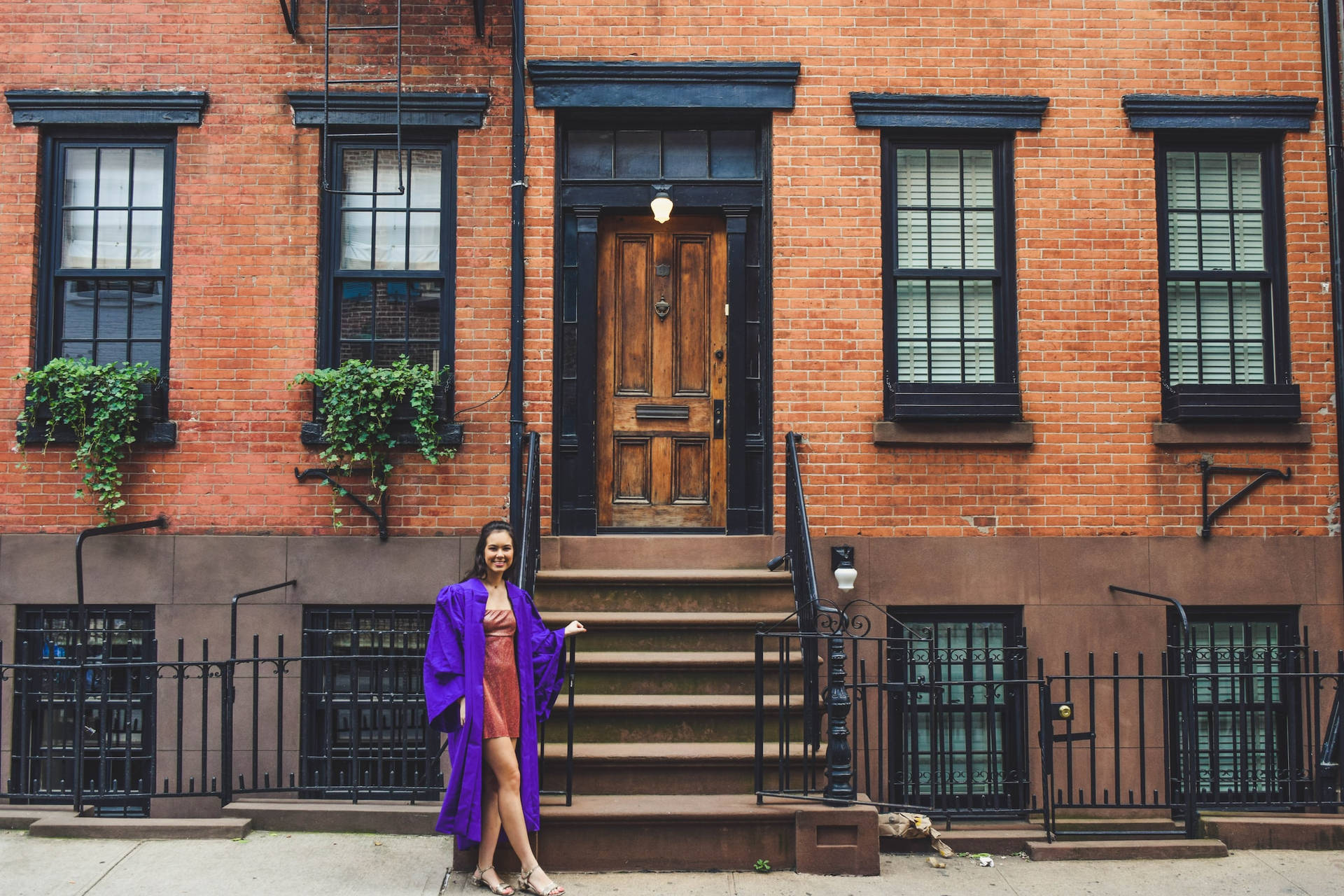 Nyu Graduate In Front Of Building