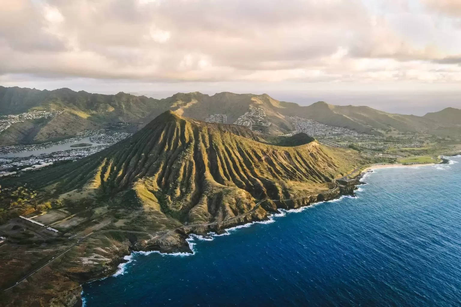 Oahu Volcanic Cone With Blue Sea Background