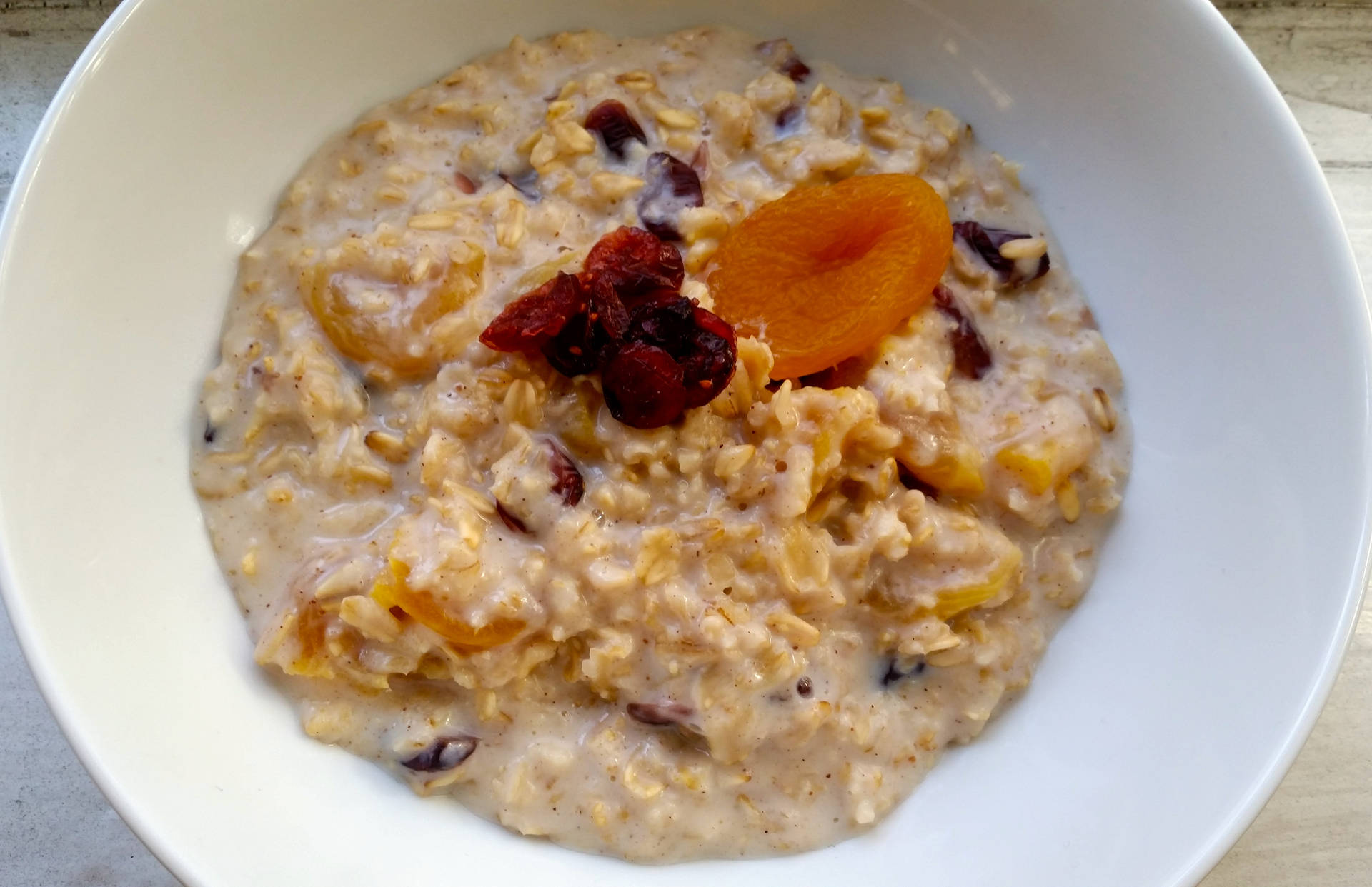 Oatmeal With Apricots And Raspberries Background