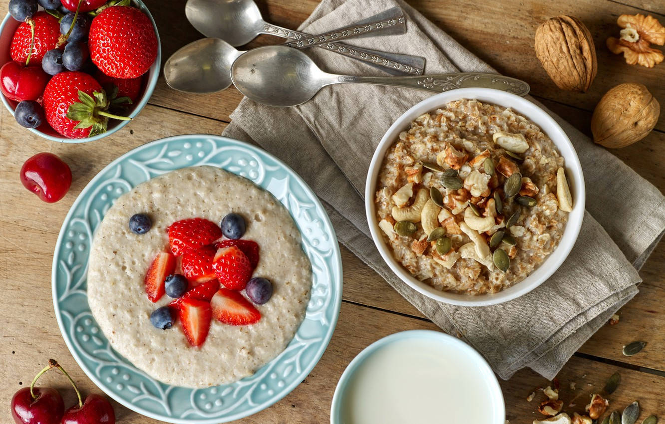 Oatmeal With Pumpkin Seeds And Porridge With Berries Background