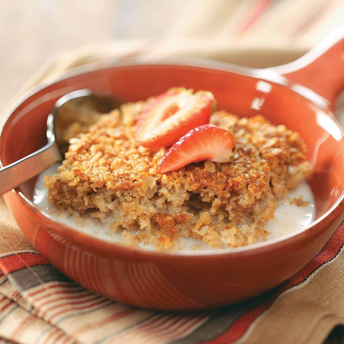 Oatmeal With Sliced Strawberries And Milk Background