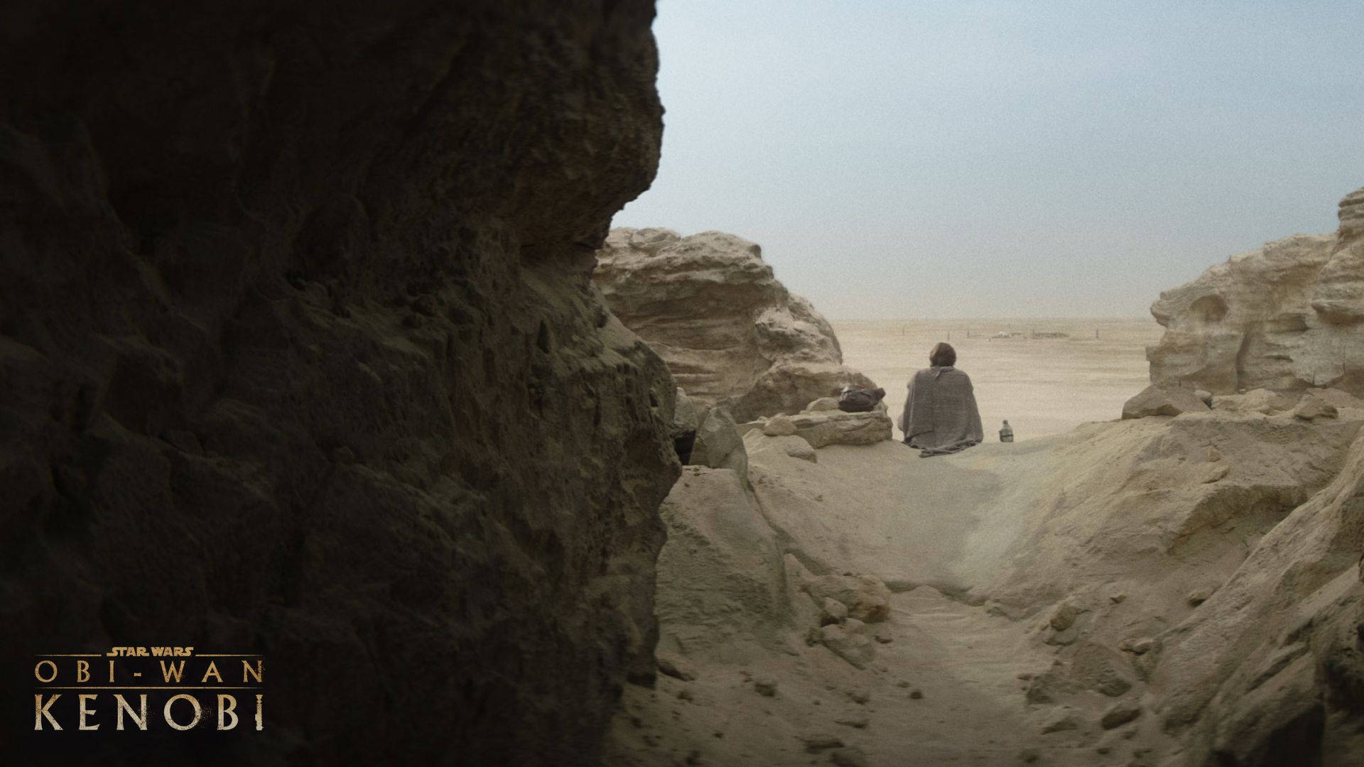 Obi Wan Kenobi On A Dune Background