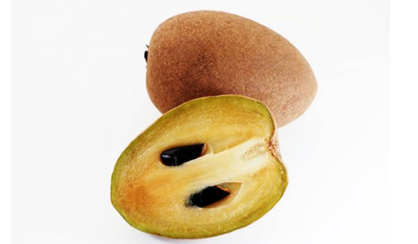 Oblong Ripe Sapodilla Fruit Background