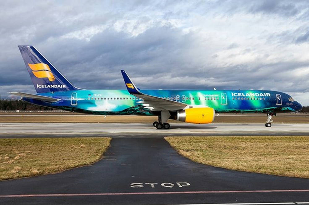 Ocean Blue Icelandair Airplane On Runway