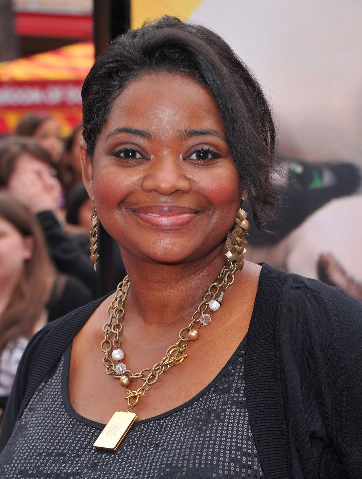 Octavia Spencer, Acclaimed American Movie Actress In A Radiant Style Background