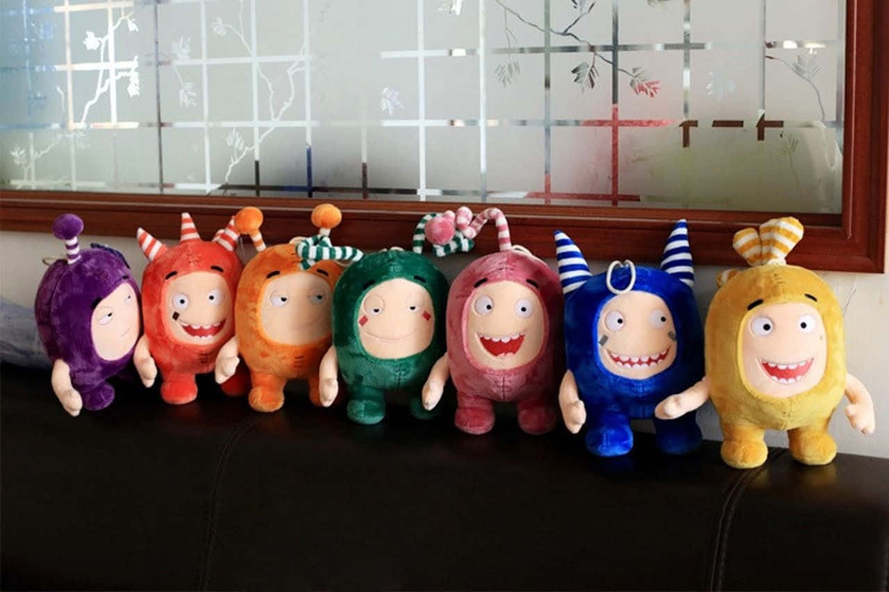 Oddbods Show Cartoon Stuffed Toys Background