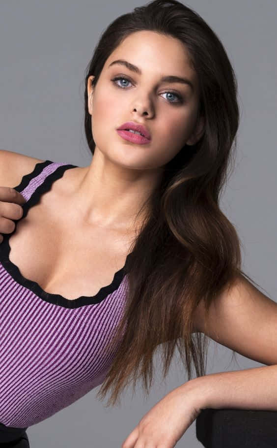 Odeya Rush Posing In Purple Top Background