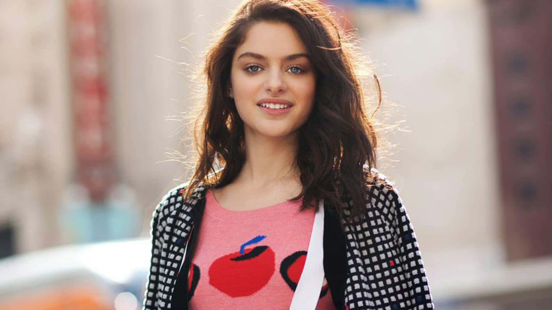 Odeya Rush Striking A Pose On The Red Carpet Background