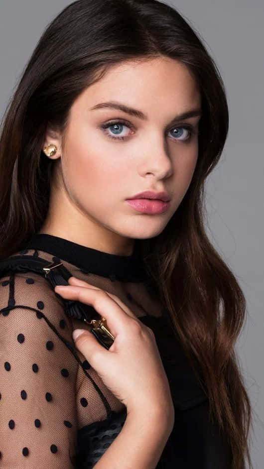 Odeya Rush Wearing A Black Dress Background