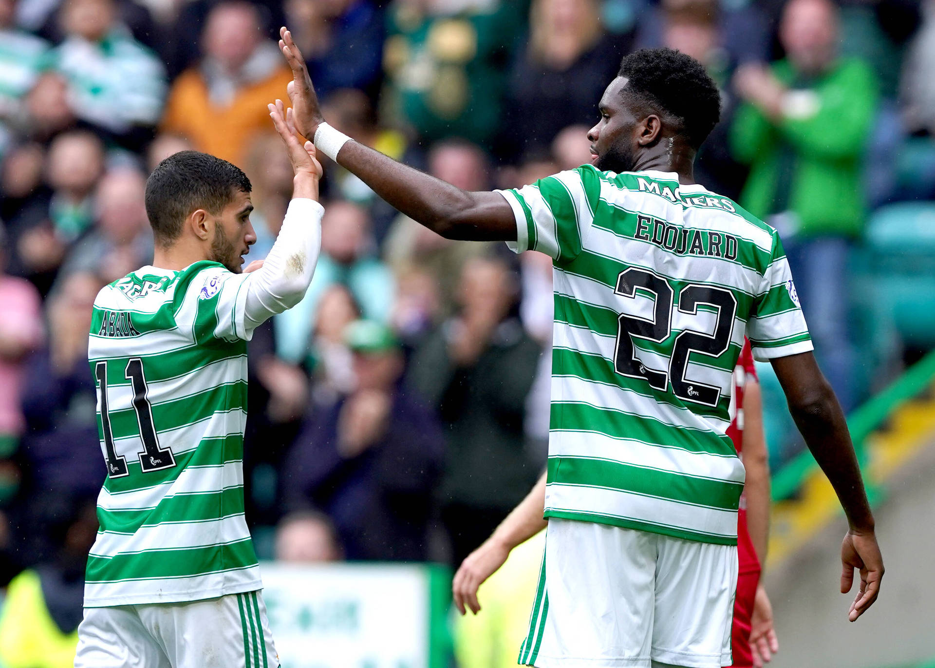 Odsonne Edouard High Five With Teammate Background