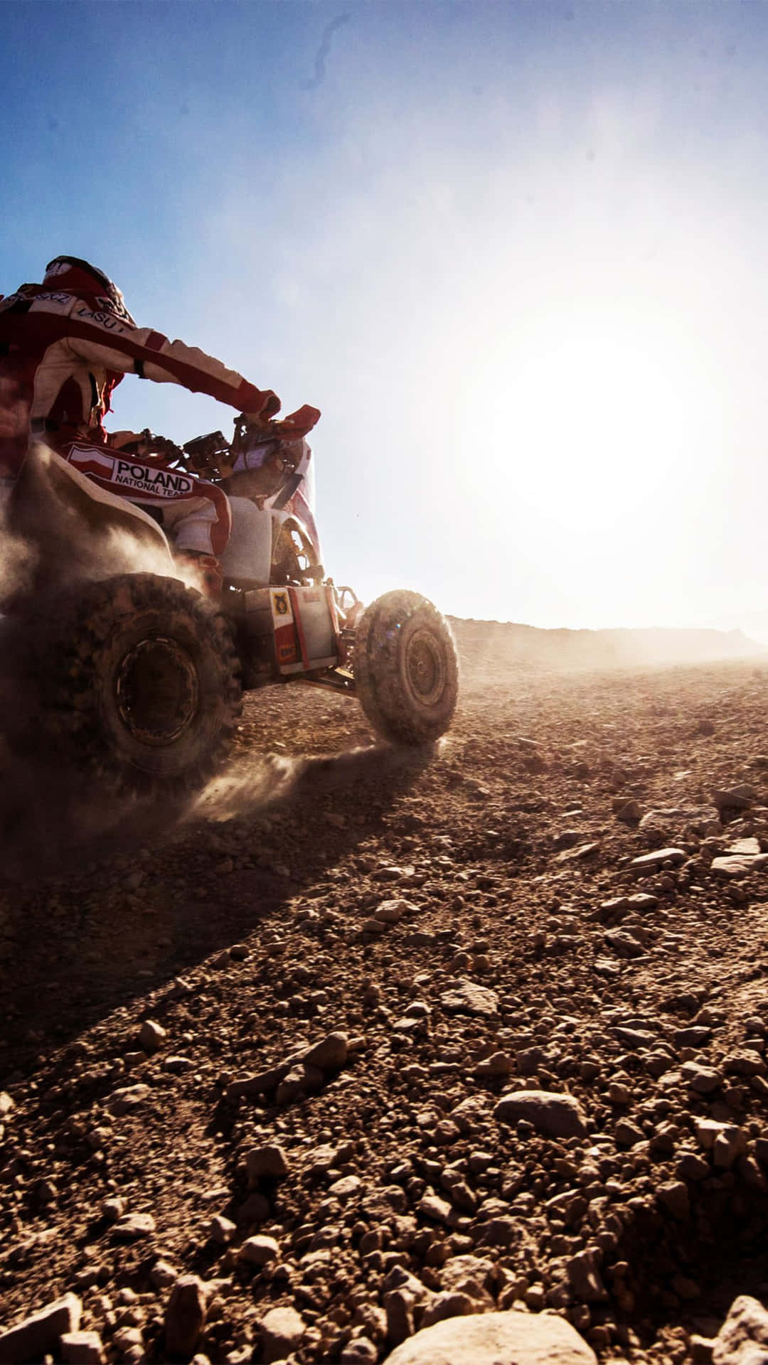 Offroad A T V Actionin Dust Background