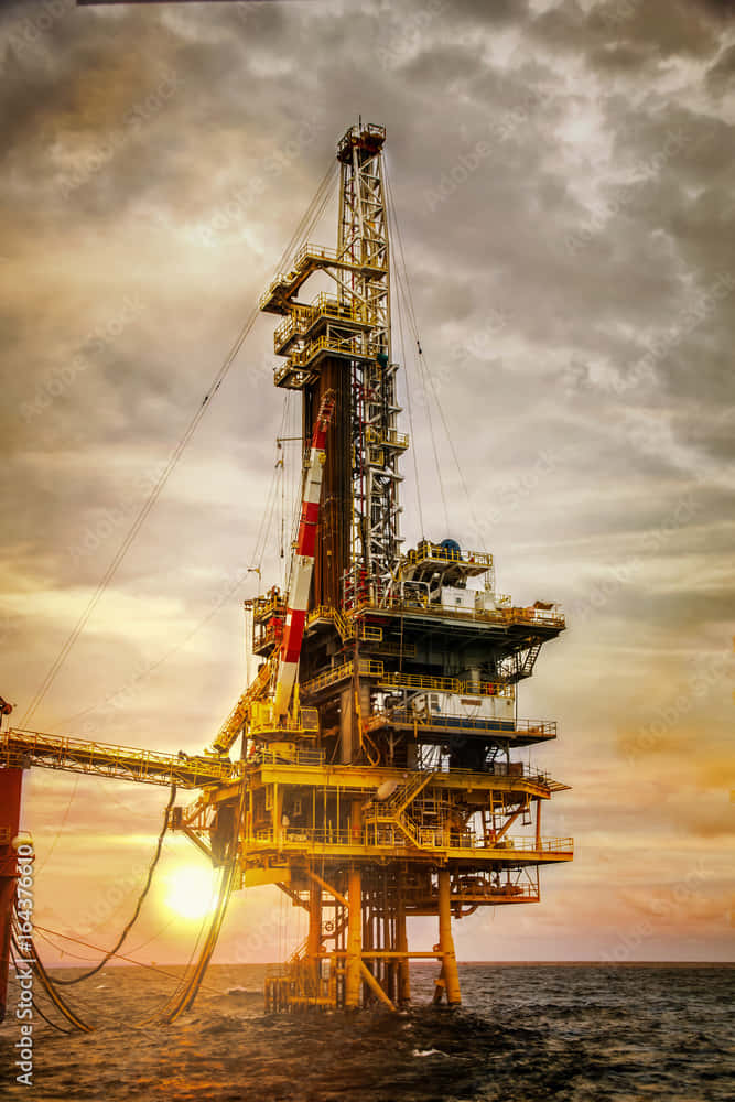 Offshore Oil Rig Platform Sunset Background