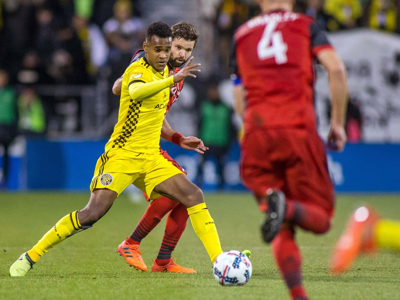 Ola Kamara Defending Ball Against Toronto Fc Background