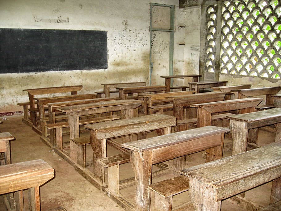 Old Classroom With Empty Chairs In Macaroon Background