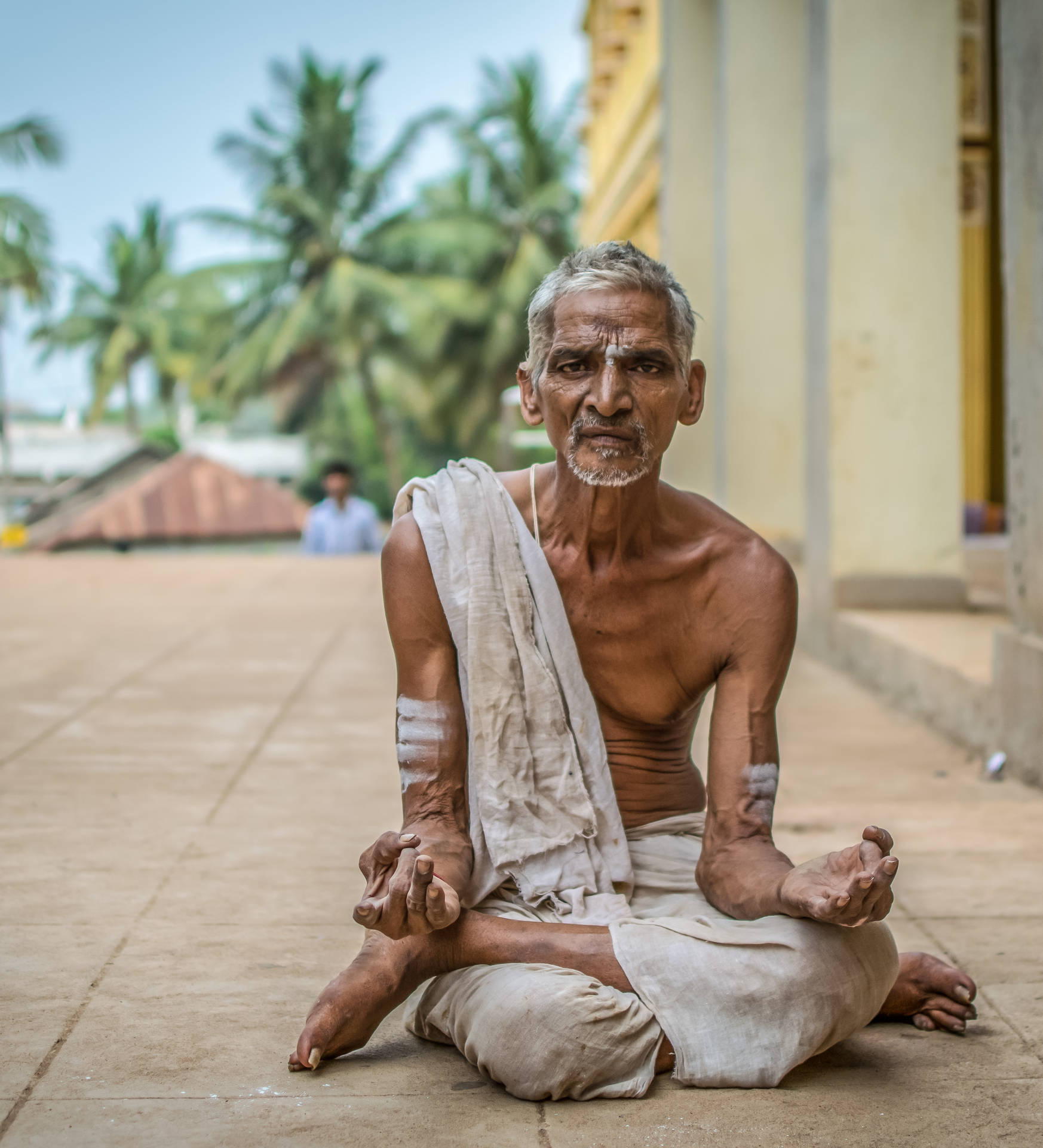 Old Hindu Man Meditating Outdoors
