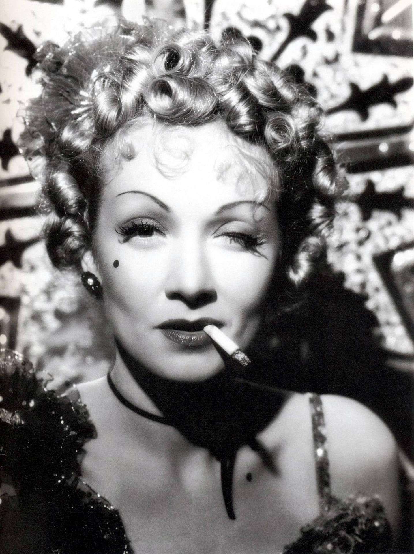 Old Hollywood Glamour - Marlene Dietrich Winking While Smoking