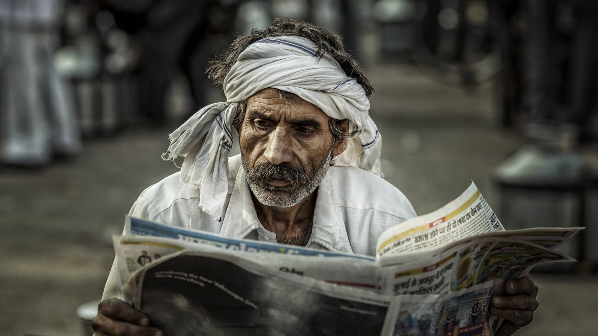 Old Man Reading Newspaper