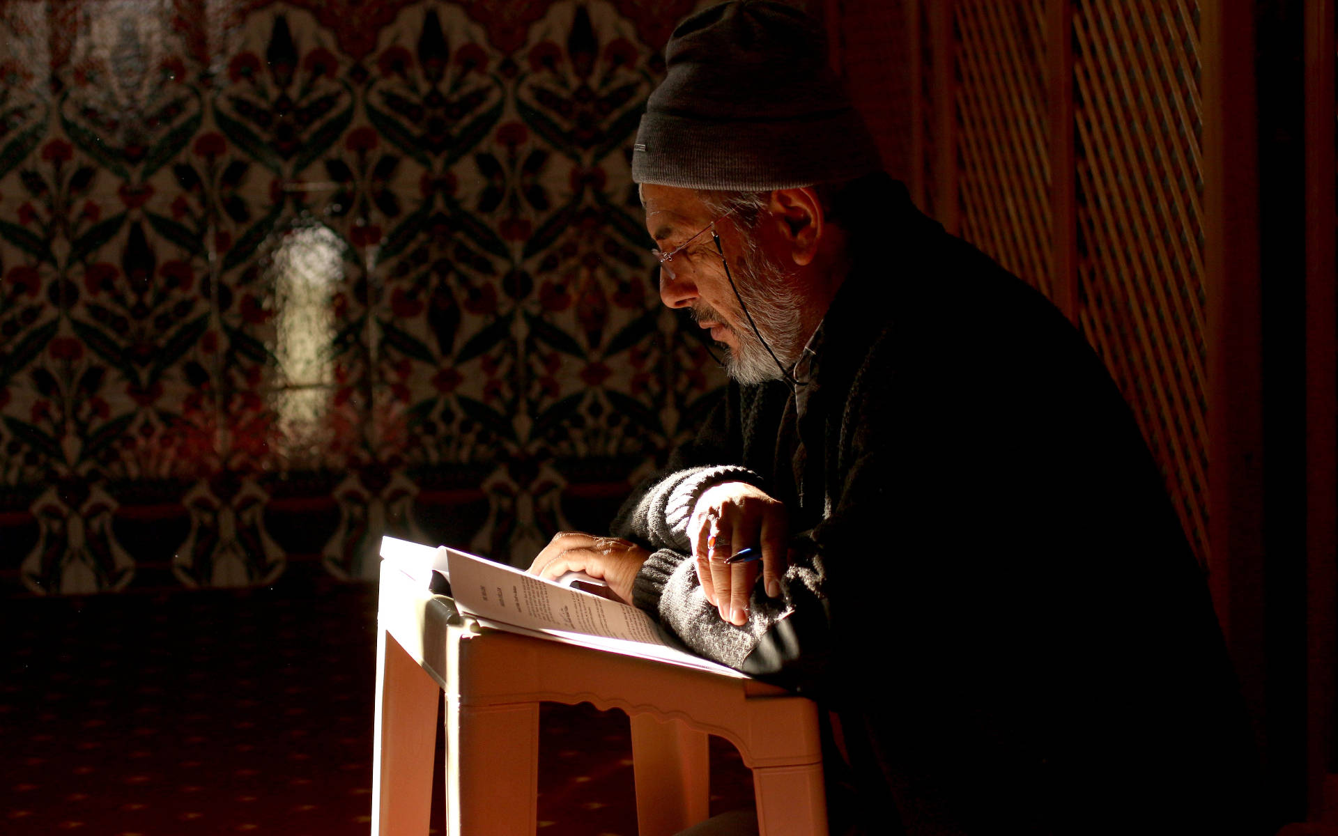 Old Man Reading Quran Background