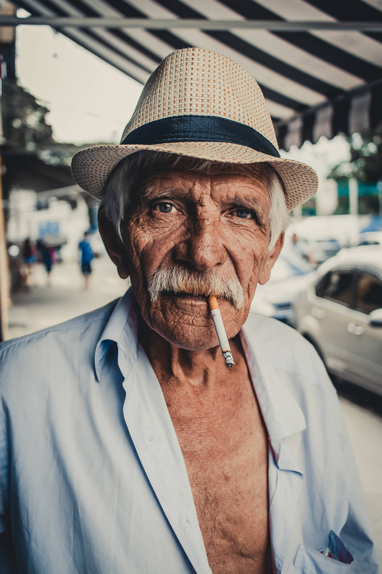 Old Man Smoking A Cigarette