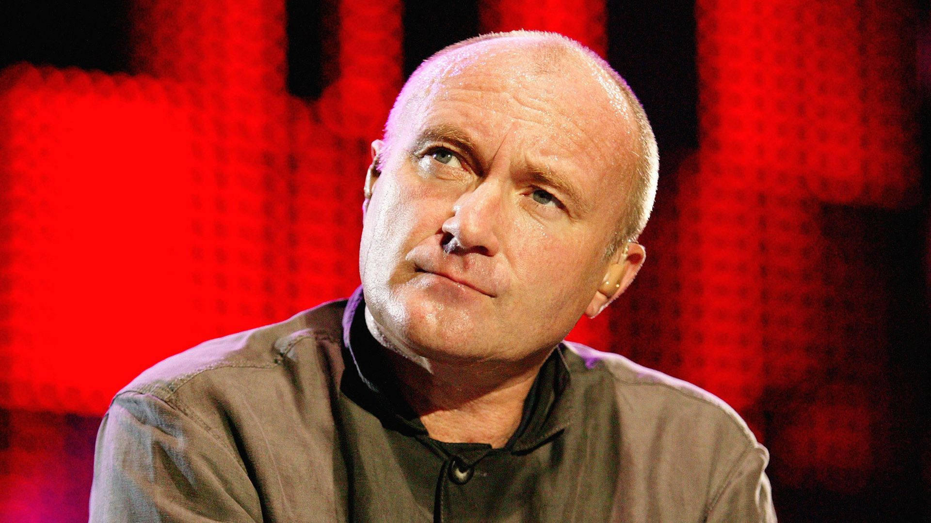 Old Phil Collins Creepy Stare Background