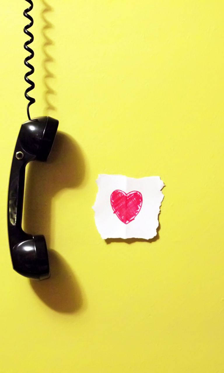 Old Telephone In Cute Yellow Background