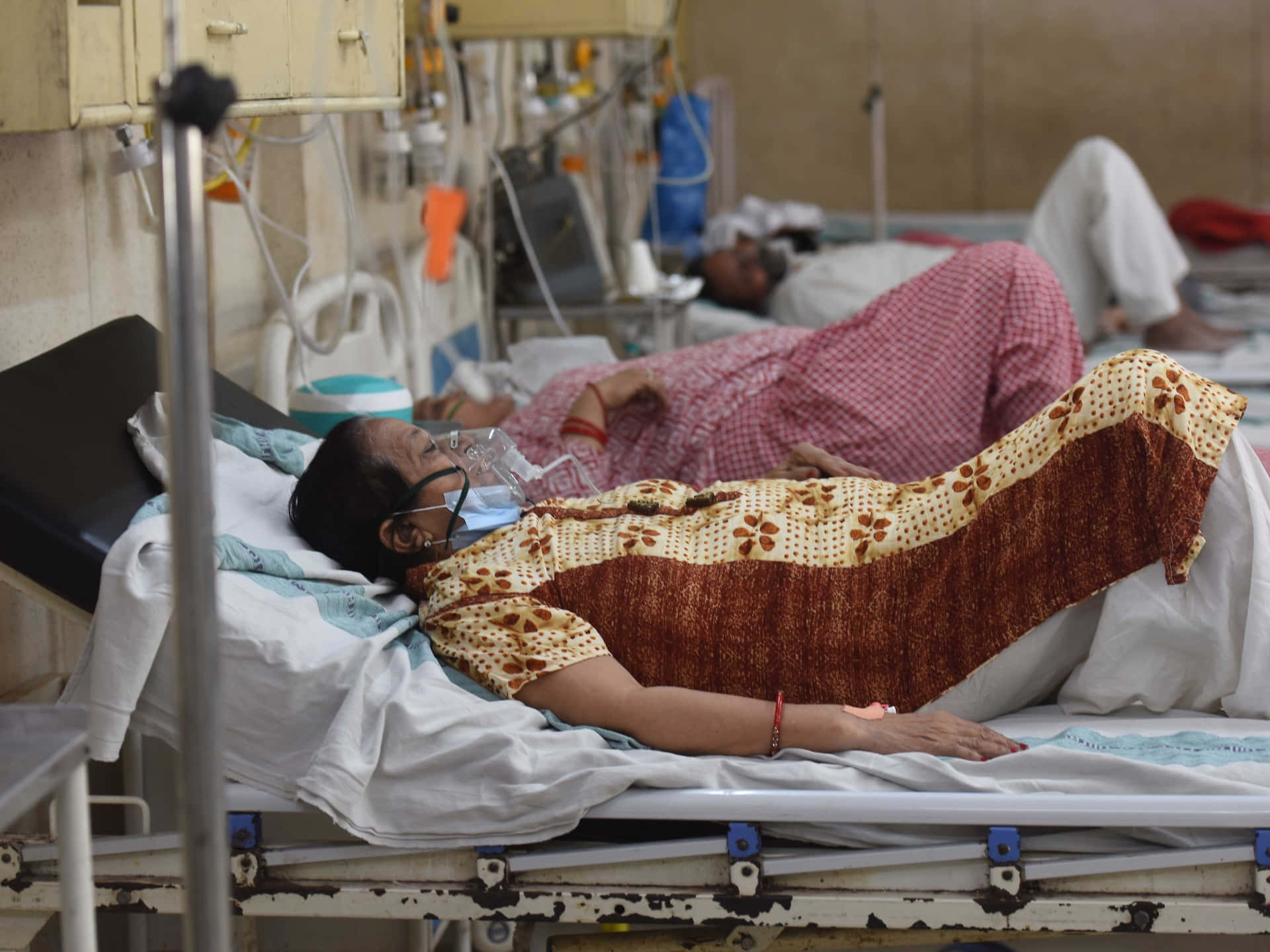 Old Woman Patient On Hospital Bed