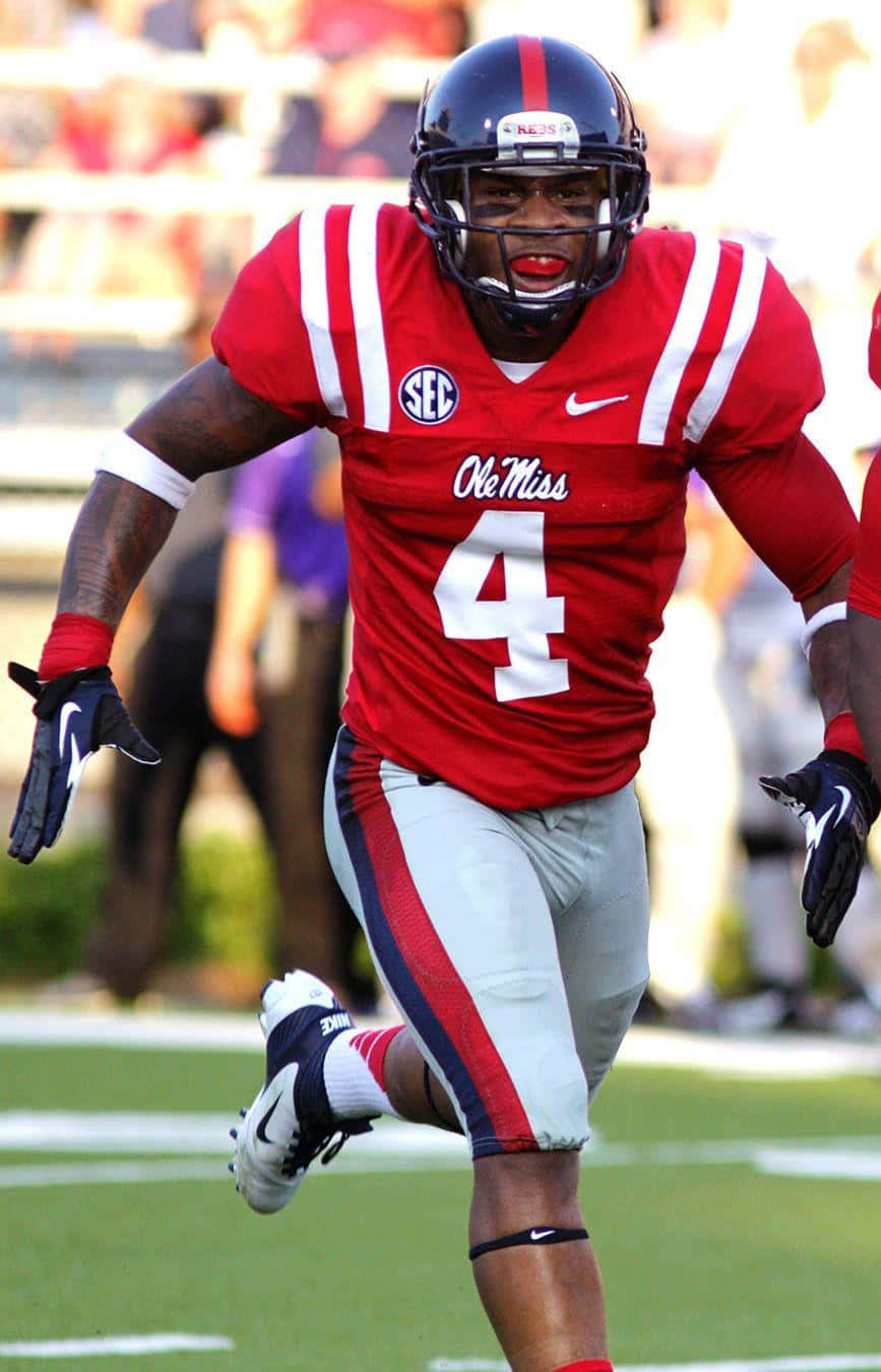 Ole Miss Football Player Running Background