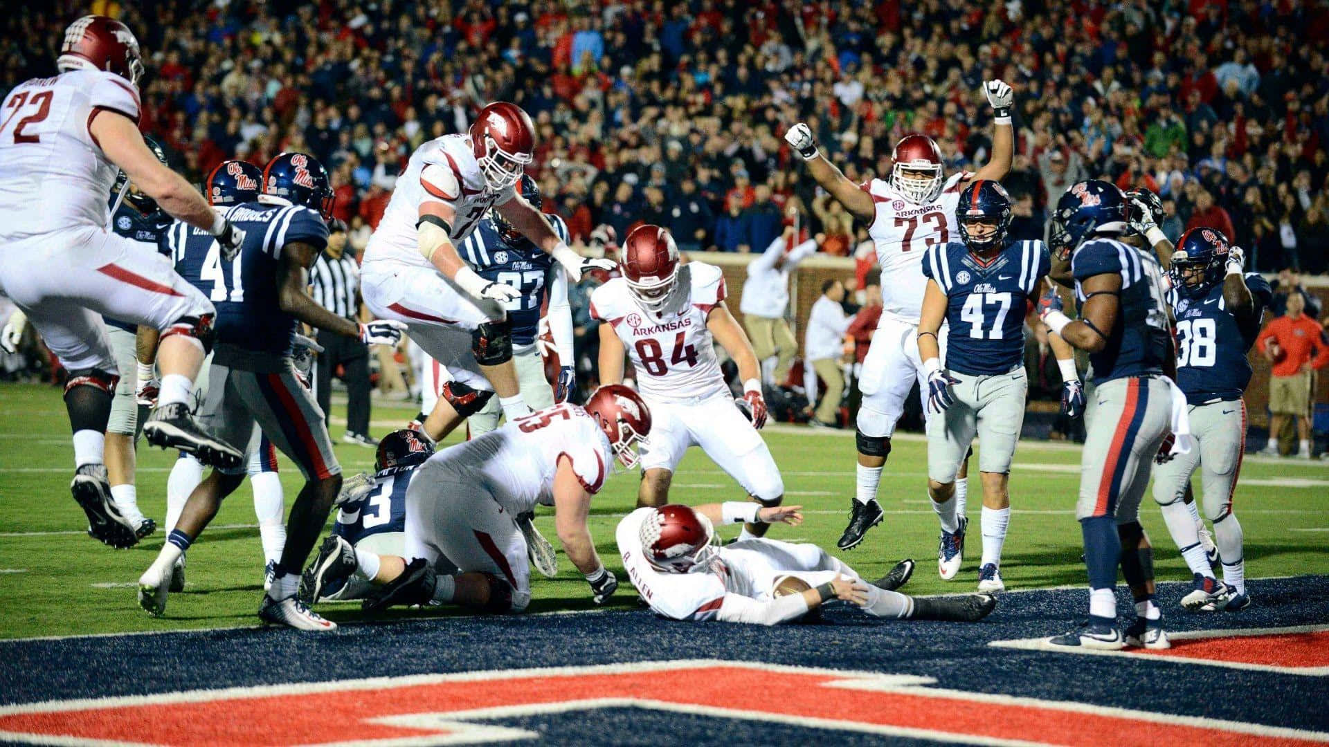 Ole Miss Stadium With Players Background