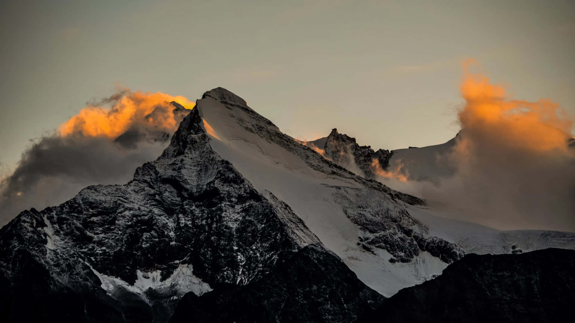 Oled Monitor Snowy Slope Of A Mountain Background