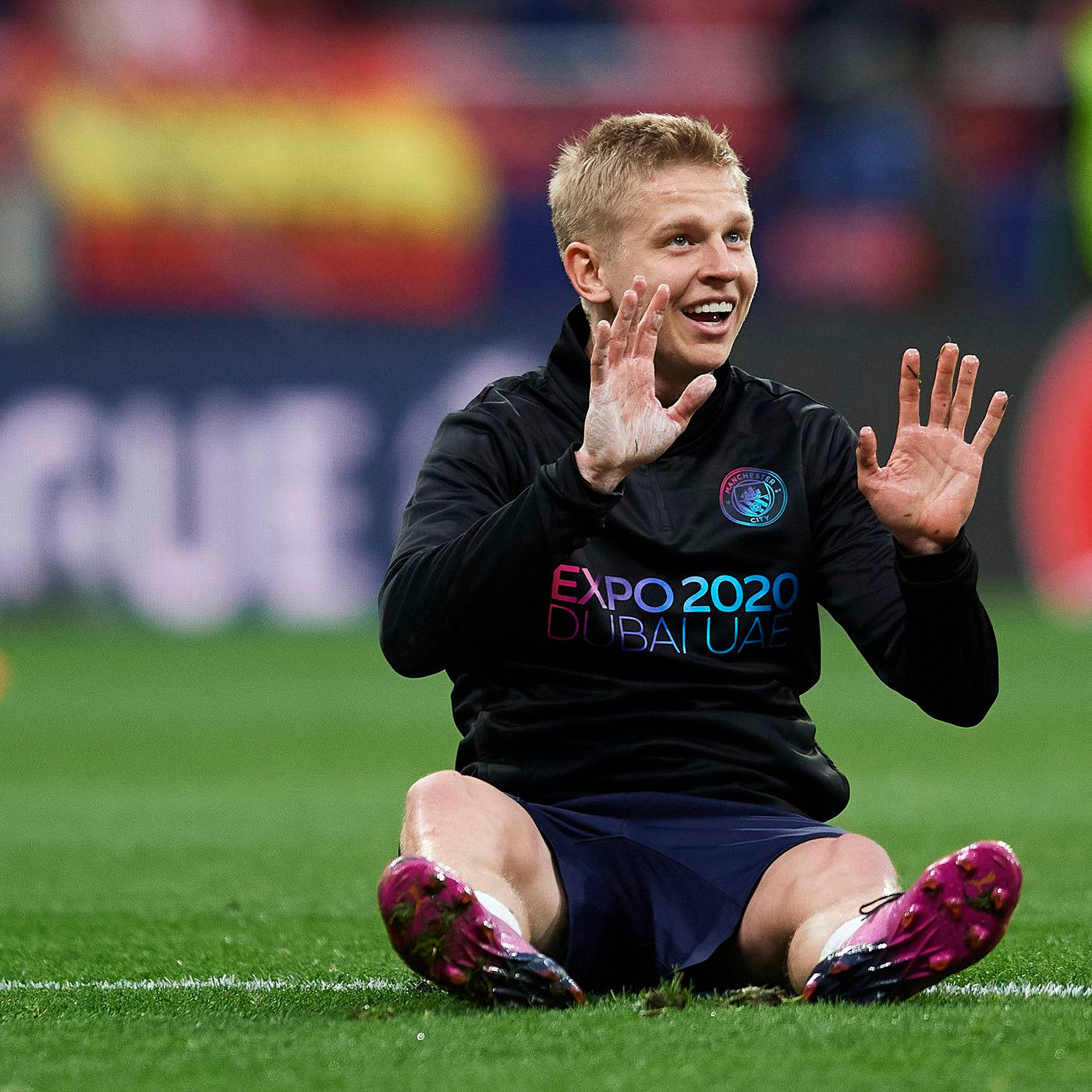 Oleksandr Zinchenko In Action On Football Field Background