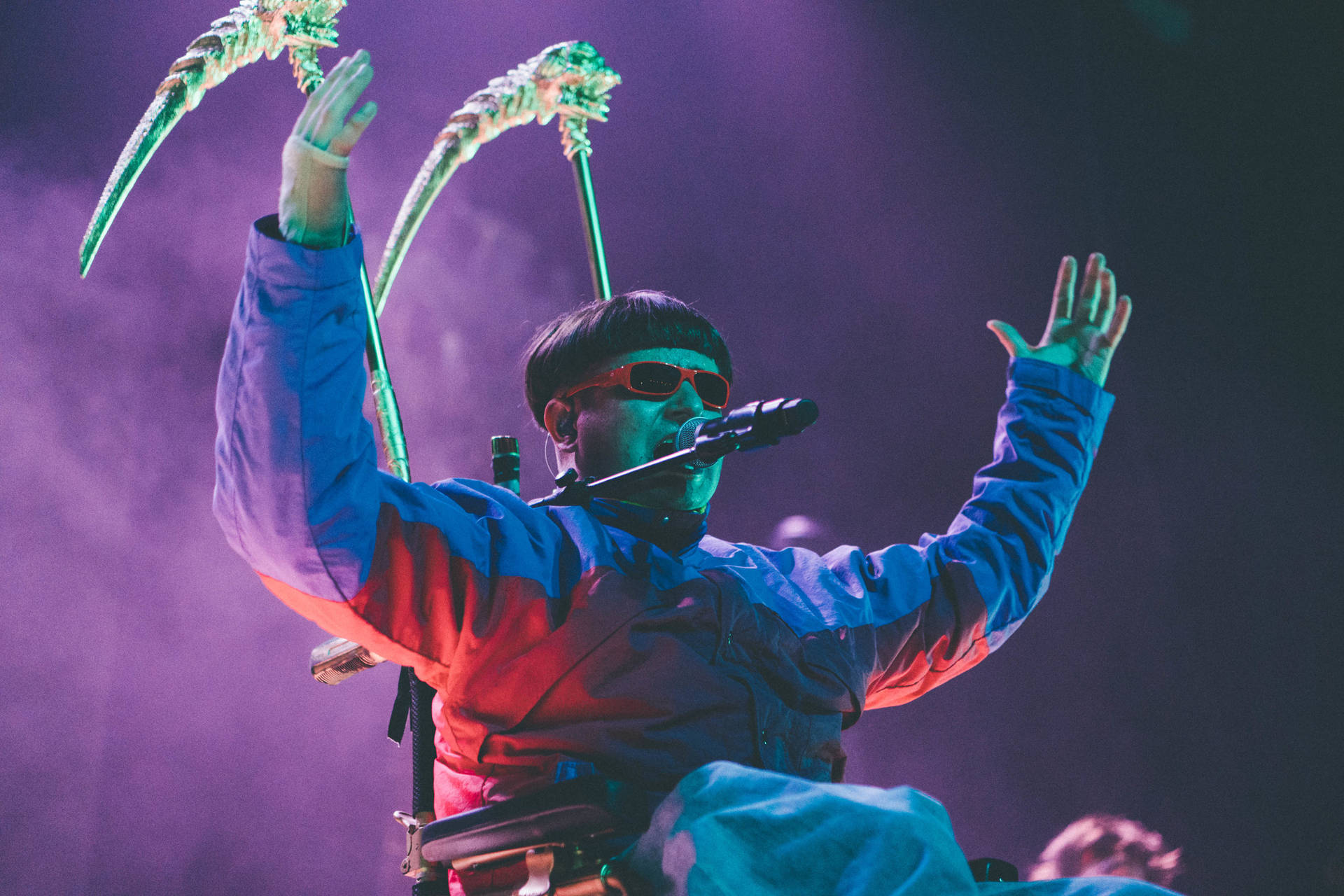 Oliver Tree Confined To A Wheelchair Background
