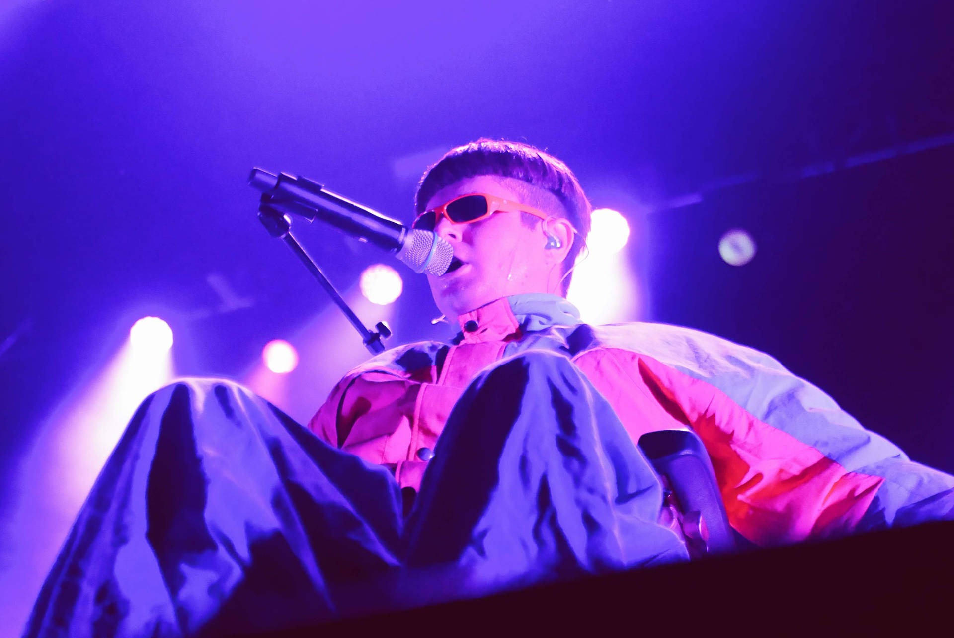 Oliver Tree Performing On Stage Background