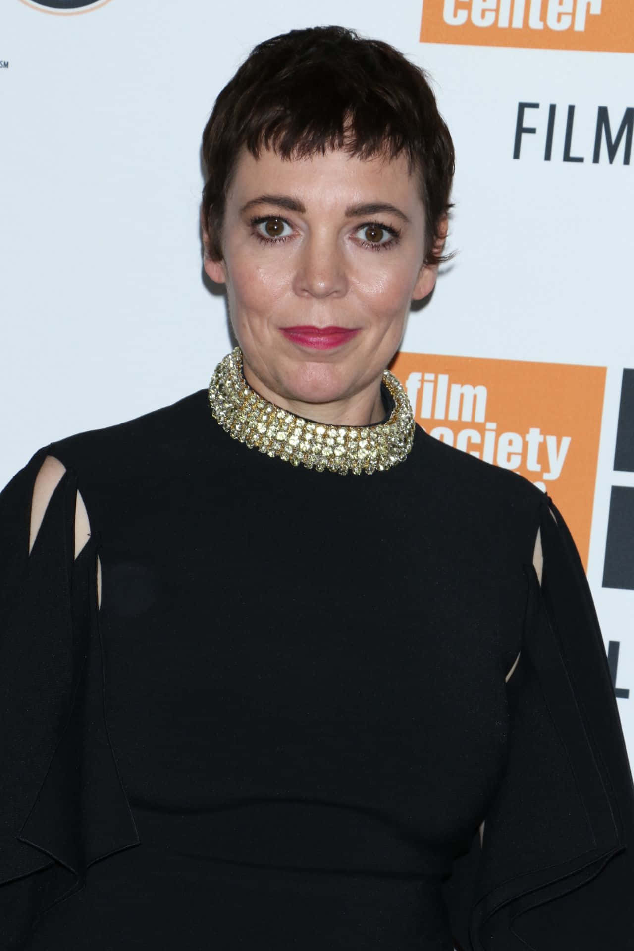 Olivia Colman - A Portrait Of Elegance Background