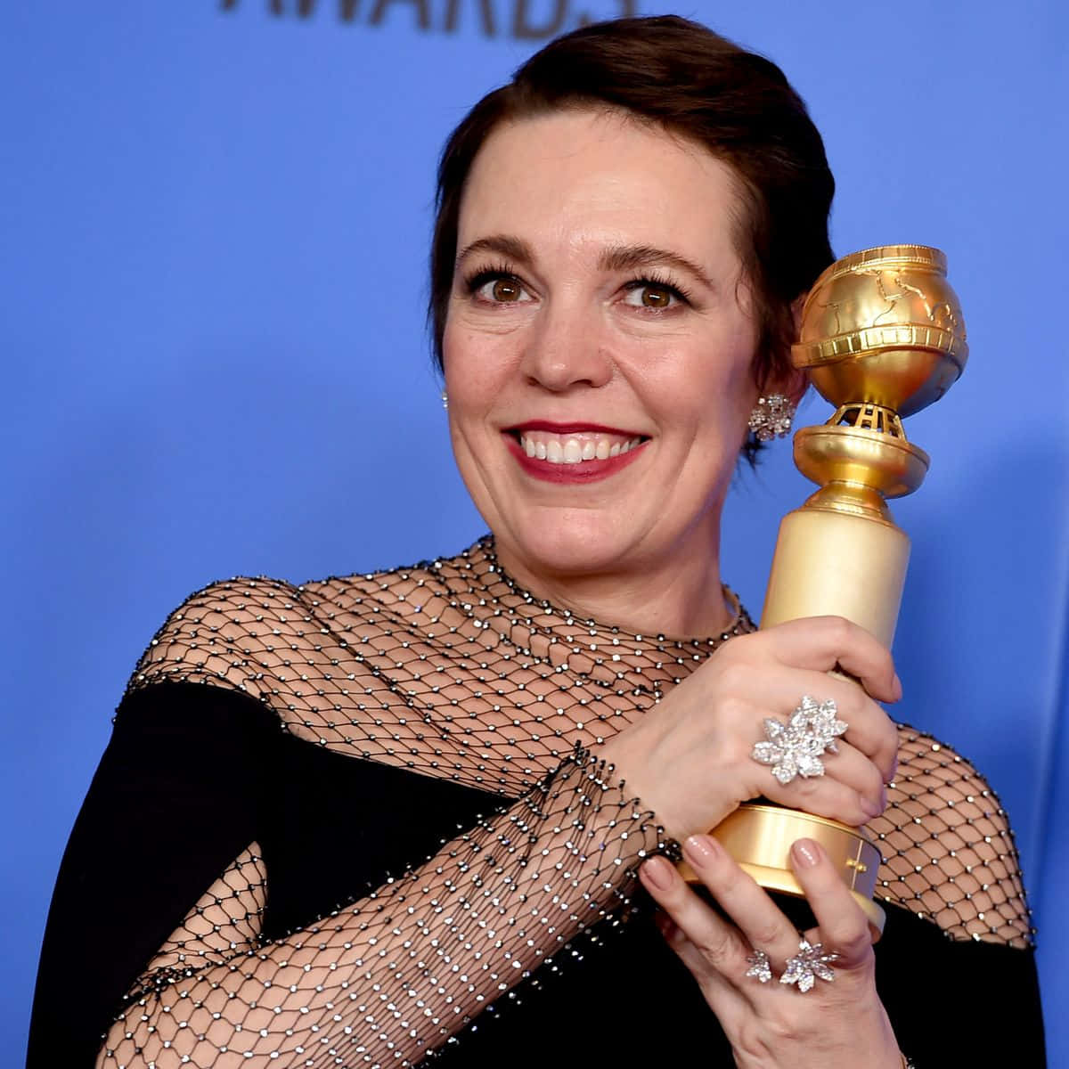 Olivia Colman Glowing Radiantly At A Red Carpet Event